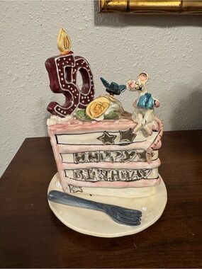 Blue Sky Clayworks designed by artist Heather Goldminc . 50th birthday cake.